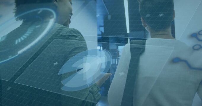 2 women walking office stepping talking left gesturing right fixing strap blue UI moving over women