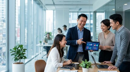 Fototapeta premium Diverse Asian professional team collaborating in a modern office