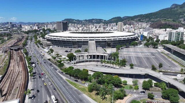 Maracana Stadium In Rio De Janeiro Brazil. Modern Football Stadium Overlooking A Dense Downtown City. Business Sky Background Downtown Cityscape. Backgrounds Up Above. Rio de Janeiro Brazil.