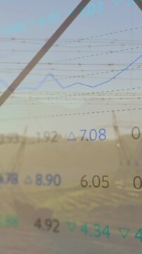 Vertical video: Numbers glowing, starting graphs over pylon blue line climbing showing power trends