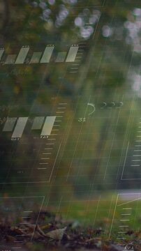 Vertical video: Chart popping up right, spurring HUD grid scale forming bars over woods for ecology
