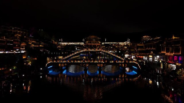 Fenghuang, China - 07.11.2025 Aerial flight over Tuojiang River, Fenghuang Ancient Town, China.