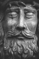 Statue of Jesus Christ after death, symbolizing sacrifice, suffering, and spiritual redemption in a dramatic and emotional composition.