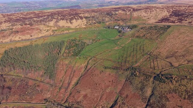Drone POV of  the Peak District National Park from the Greenfield. Greenfield Reservoir is a reservoir in the Saddleworth parish of the Metropolitan Borough of Oldham in Greater Manchester.