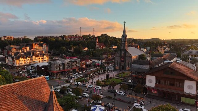 Aerial view of S&atilde;o Pedro Chucrch and houses with European Alpine architecture on Borges de Medeiros Avenue - Gramado, Rio Grande do Sul, Brazil