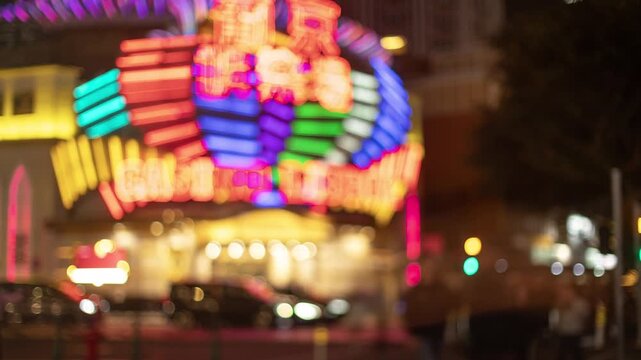 neon casino sign in the city of macau blur 