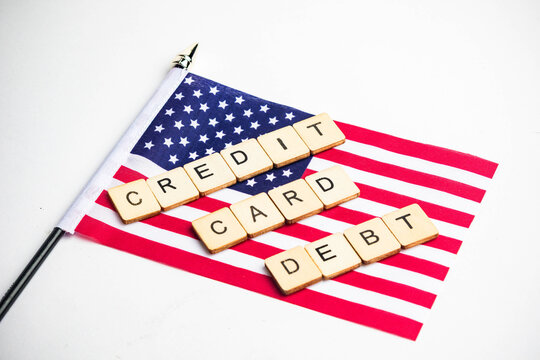 The American Flag With A Credit Card Debt Sign Across
