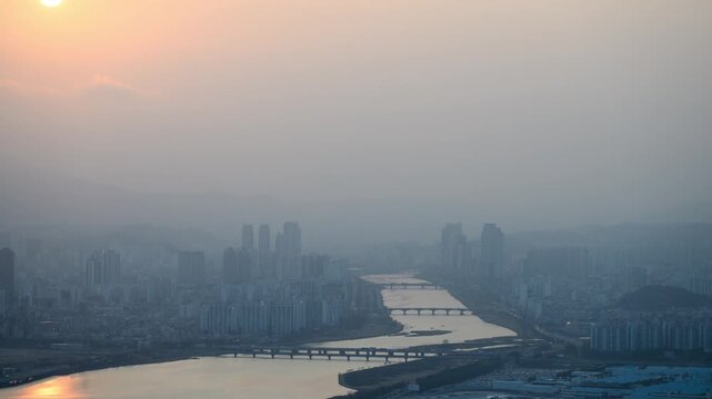 Ulsan Skyline Timelapse at Sunset with Smog and Sun Fading into Haze