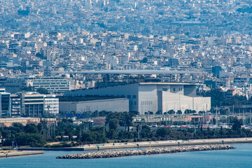 Obraz premium A cityscape view of Athens as seen from Piraeus over the Saronic Gulf in Greece.