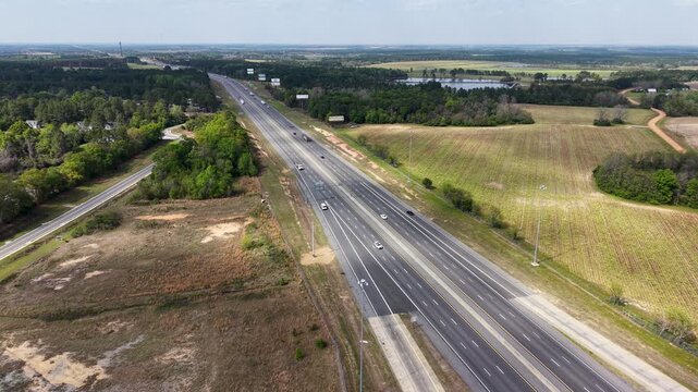 Aerial footage of cars driving on the highway in Ashburn Georgia USA