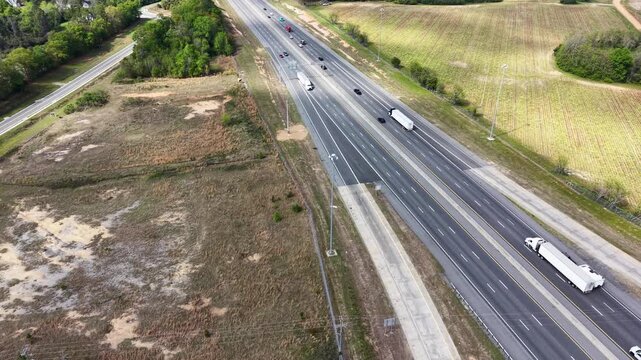 Aerial footage of cars driving on the highway in Ashburn Georgia USA