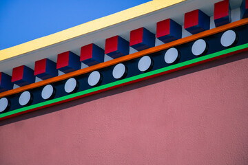 A colorful cornice under the roof of a Buddhist temple, seen from below, Dzogchen Beara, a Buddhist retreat center, Beara Peninsula in Allihies, County Cork, Ireland, March 21, 2026 © Olha K
