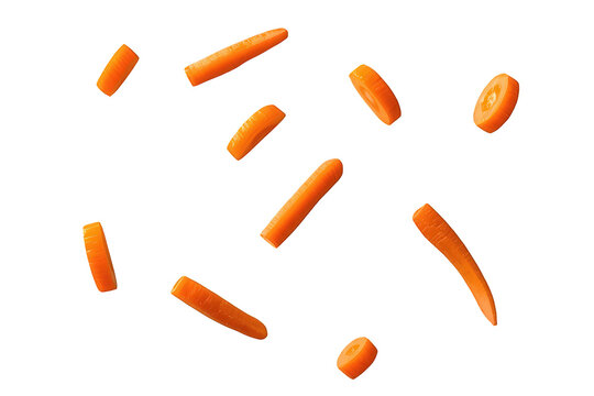 Fresh orange carrots flying, showing different cuts like sticks, slices, and pieces, healthy raw food on transparent background