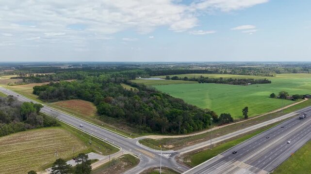 Aerial footage of homes, trees and grass in Ashburn Georgia USA