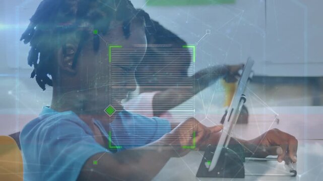 Network of connections over african american boy using digital tablets at school