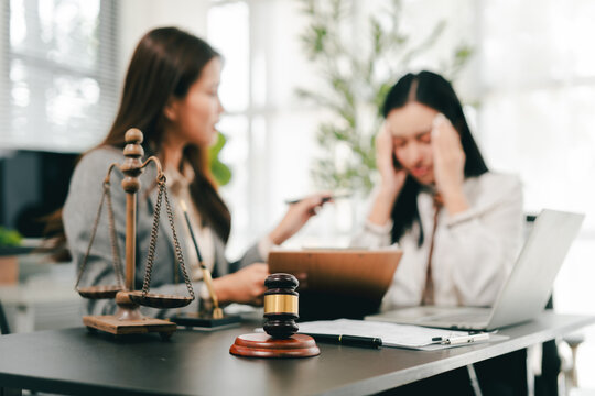 A female lawyer who advises clients at a law firm.