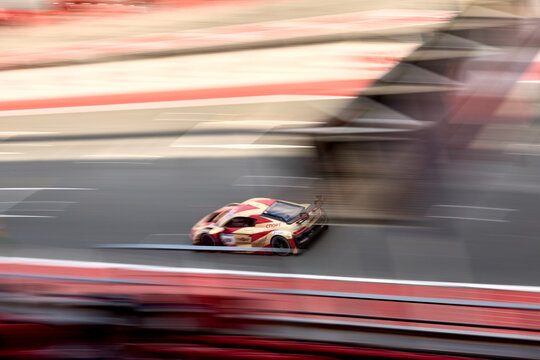 UAE, Dubai, 18 January 2026: 24h series racing supercars on the circuit, Battle of the teams, long exposure photography, supercars drive past at high speed, pitstops, training runs, watching people, 