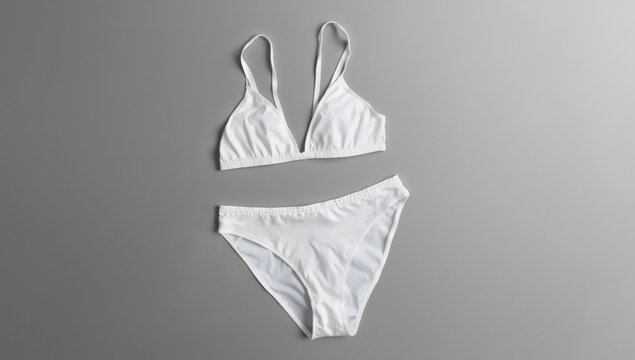 White bikini swimsuit with underwear on gray background lingerie swimwear