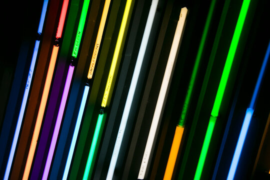 Colorful neon light tubes with different gases, abstract glowing lines