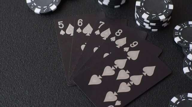 Playing cards and chips on a table, a gambling game of poker. Cards and chips on a gaming table as a background for your design
