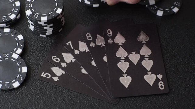 Playing cards and chips on a table, a gambling game of poker. Cards and chips on a gaming table as a background for your design