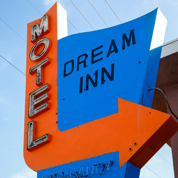 Vintage motel sign Dream Inn, retro roadside Americana