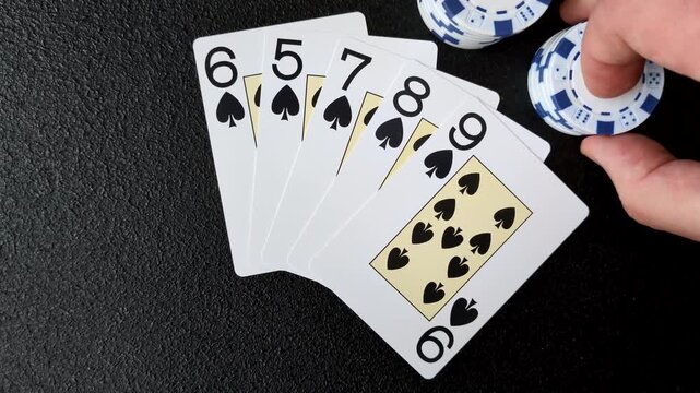 Playing cards and chips on a table, a gambling game of poker. Cards and chips on a gaming table as a background for your design