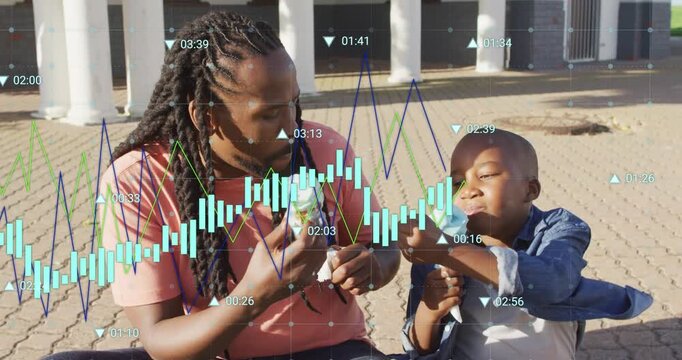 Child taking first lick and causing data graph overlay while adult wiping hands, both eating cones