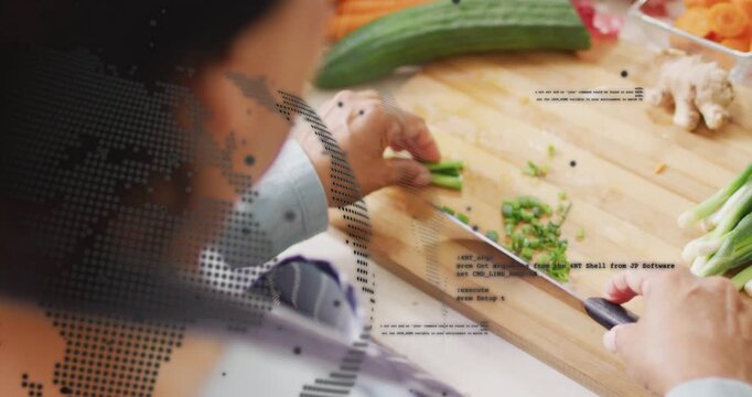 Senior woman placing veg, chopping on cutting board, dotted code overlay thinning for cooking