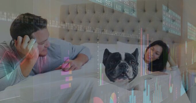 Dog raising head causing couple leaning in to pet on bed, data overlay syncing with movement