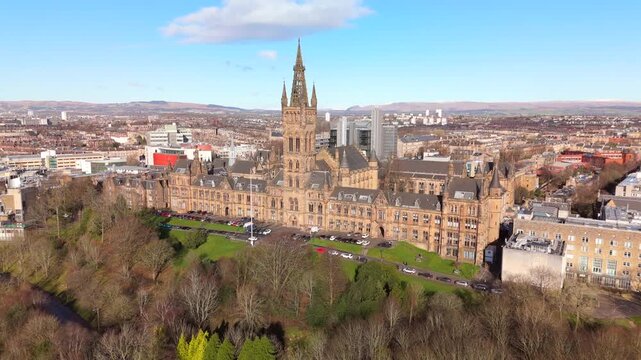 Drone view of Kelvingrove Park and Gilmorehill on a sunny golden hour winter morning in Glasgow Scotland