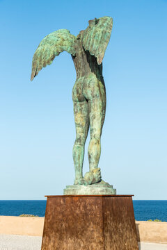 Ortigia, Sicily, Italy - October 1, 2024: The sculpture Ikaria by Polish artist Igor Mitoraj located near Castello Maniace in Ortigia.