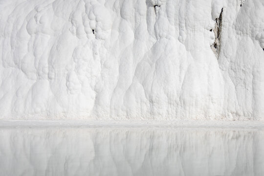 White travertine wall reflection in Pamukkale Turkey