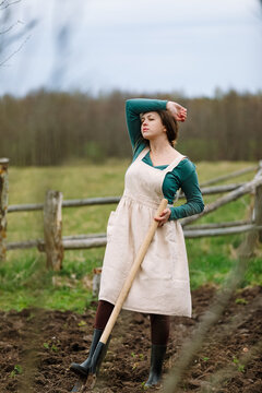 Woman relaxing after working in the garden