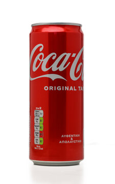 Gaziveren Cyprus -23.11.2024 Coca-Cola carbonated 0.33 l, tin can Refreshing summer beverage in vibrant red can set against a clean, white backdrop
