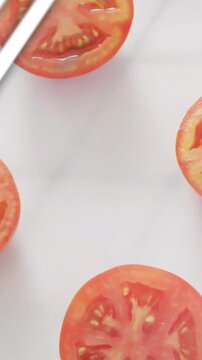 Vertical video: Teal bars rising, tomato half shifting while stripes sliding, chart showing code