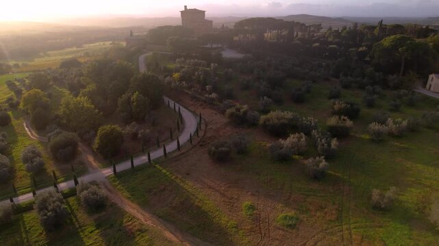 Tuscany Landscape at Golden Hour, Iconic Winding Road with Cypress Trees Leading to Traditional Italian Farmhouse in Val d'Orcia, Misty Summer Morning Scenic Rural Estate Travel Destination 4K