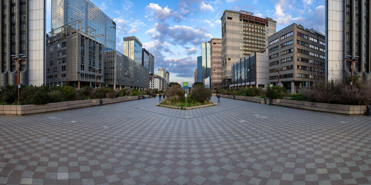 Geometric pedestrian plaza within the Naples business district.
