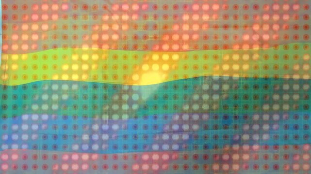 Animation of rainbow flag over spots