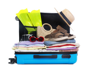 Open suitcase full of belongings isolated on white © New Africa