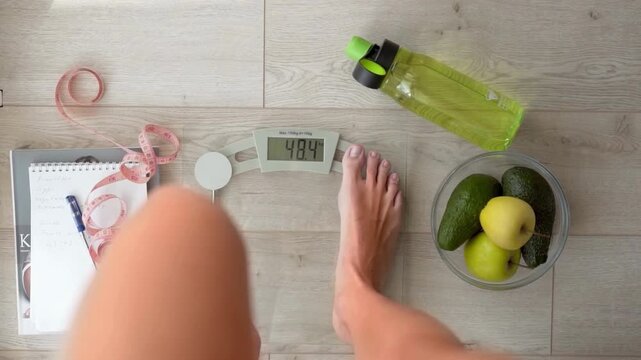 skinny girl's lean legs showing perfect weight closeup.