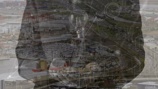 Animation of network of connections over caucasian businessman throwing light bulb