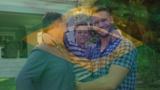 Animation of flag of brazil over caucasian family smiling