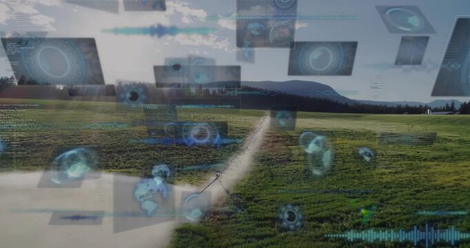 Animation of digital interface overlaying rural landscape with fields and mountains
