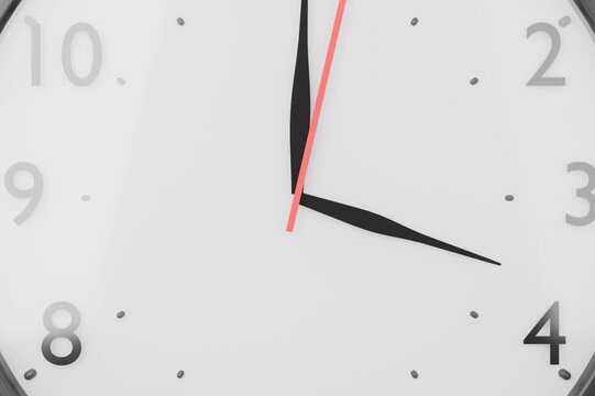 Analog wall clock with moving hands on a green screen background