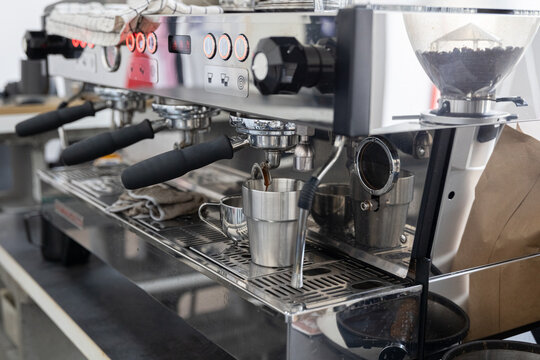 Espresso machine preparing coffee, barista workspace and cafe equipment