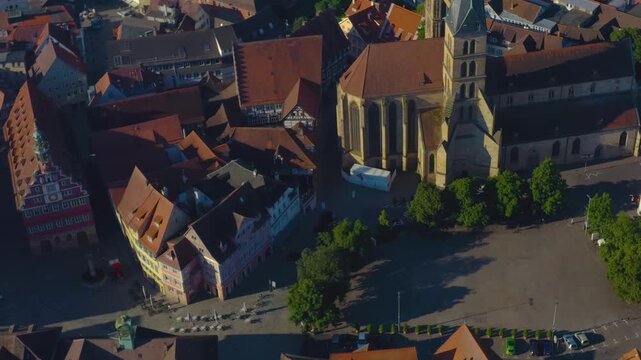 An panoramic aerial view around the old town in the city Esslingen on a sunny summer afternoon in Germany .