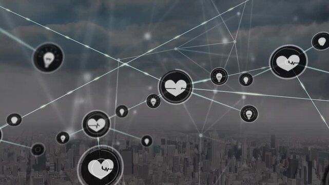 Animation of bulb and heart shape icons connected with lines over cityscape with cloudy sky