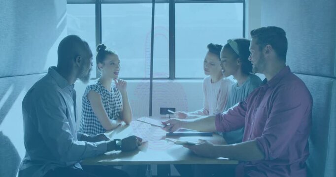 Animation of padlock icon over diverse business people having meeting at office