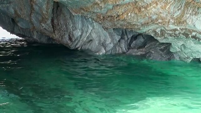 Discover pristine blue-green waters flowing through the breathtaking Marble Caves. Marvel at the unique sculpted formations in Patagonia. A truly tranquil journey.